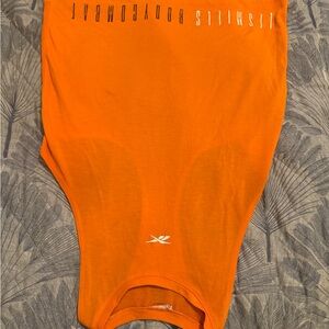 Orange LesMillls body combat tank
